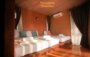 View of a room room at The Laguna Cheow Lan, floating bungalows on the Rajjaprabha Dam lake.