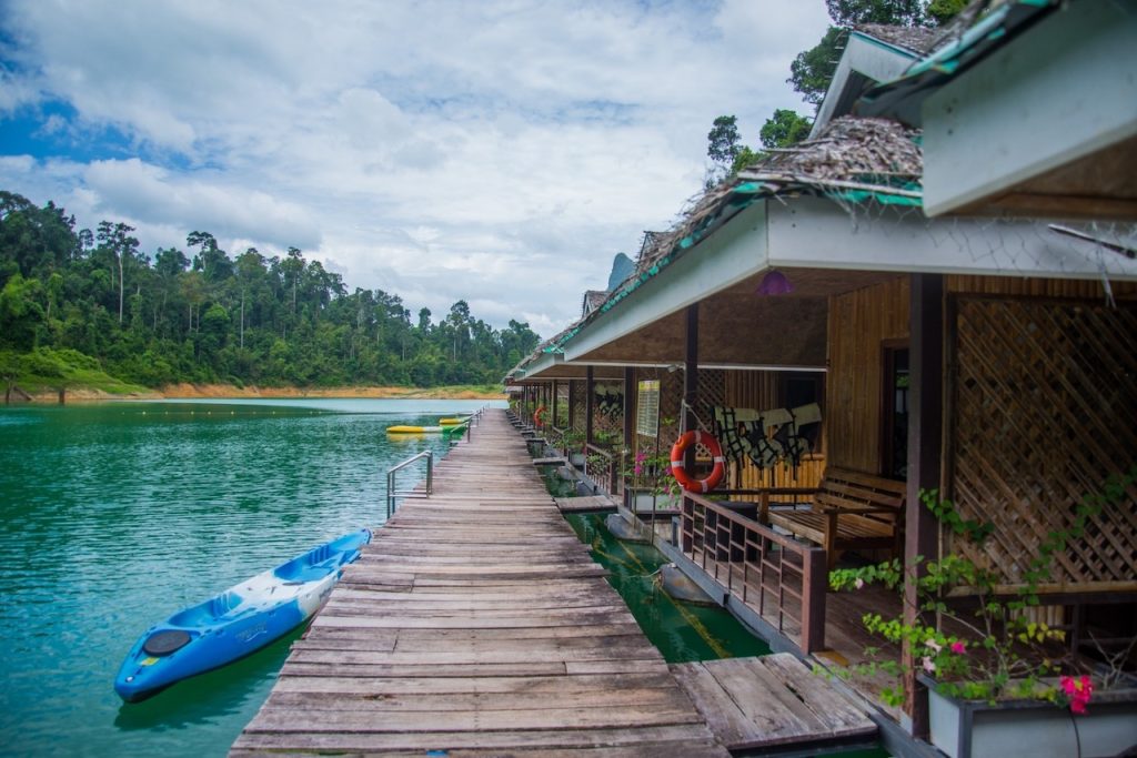 Kayak moored In front of the floating bungalows in the Cheow Lan Lake, Khao Sok National Park.